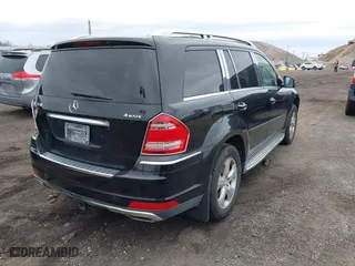 2012 Mercedes-Benz GL-Class GL 450 with VIN 4JGBF7BE9CA763928, listed as a IAAI auction lot 42092738 with 168,971 mi miles. Bid and sale history available at carsss.com. Image 4.