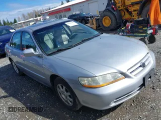2002 Honda Accord SE z VIN 1HGCG56712A070972, wystawiony jako IAAI lot #41891399 z przebiegiem 188 693 mil mil oraz . Historia ofert i sprzedaży dostępna na DreamBid. Obrazek 1.