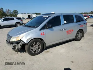 2012 Honda Odyssey EX-L with VIN 5FNRL5H61CB091175, listed as a Copart auction lot 80116294 with 315,023 mi miles and Salvage Title. Bid and sale history available at carsss.com. Image 1.