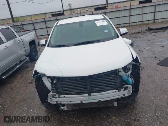 2019 Chevrolet Traverse LT Cloth z VIN 1GNERGKW2KJ128010, wystawiony jako IAAI lot #42173006 z przebiegiem 93 328 mil mil oraz . Historia ofert i sprzedaży dostępna na DreamBid. Obrazek 13.