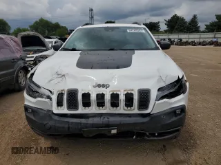 2019 Jeep Cherokee Trailhawk Elite with VIN 1C4PJMBX7KD140720, listed as a Copart auction lot 64268064 with 61,747 mi miles and Salvage Title. Bid and sale history available at carsss.com. Image 5.