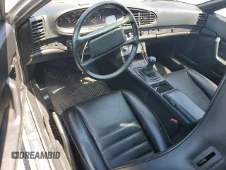 1986 Porsche 944 z VIN WP0AA0946GN459926, wystawiony jako Copart lot #52357845 z przebiegiem 89 937 mil mil oraz Szkoda całkowita • Salvage title. Historia ofert i sprzedaży dostępna na DreamBid. Obrazek 8.