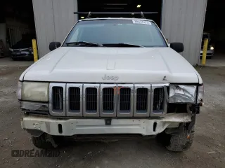 1997 Jeep Grand Cherokee Laredo with VIN 1J4GZ58SXVC597519, listed as a Copart auction lot 88437475 with 172,051 mi miles and Salvage Title. Bid and sale history available at carsss.com. Image 5.
