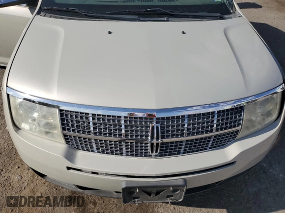2007 Lincoln MKX z VIN 2LMDU88C07BJ26919, wystawiony jako Copart lot #55778005 z przebiegiem Nie podano mil oraz Szkoda całkowita • Salvage title. Historia ofert i sprzedaży dostępna na DreamBid. Obrazek 11.