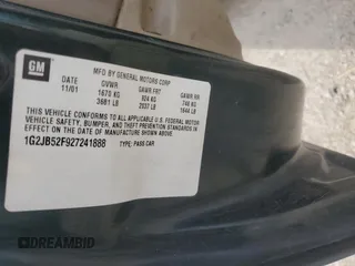 2002 Pontiac Sunfire z VIN 1G2JB52F927241888, wystawiony jako Copart lot #65939404 z przebiegiem 224 388 mil mil oraz Szkody całkowita. Historia ofert i sprzedaży dostępna na DreamBid. Obrazek 12.