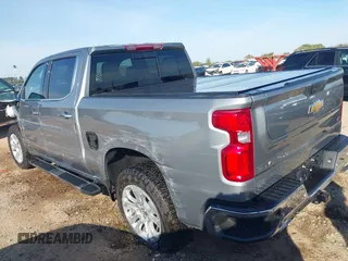 2024 Chevrolet Silverado 1500 LTZ with VIN 1GCUDGE84RZ309881, listed as a IAAI auction lot 41837654 with 8,873 mi miles and . Bid and sale history available at DreamBid. Image 3.