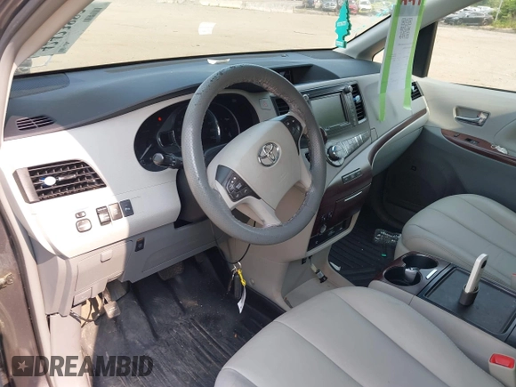 2012 Toyota Sienna XLE with VIN 5TDDK3DC6CS032969, listed as a IAAI auction lot 42423883 with 122,676 mi miles and . Bid and sale history available at DreamBid. Image 5.