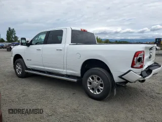 2023 Ram 2500 Laramie with VIN 3C6UR5FJ1PG634158, listed as a Copart auction lot 57164505 with 18,279 mi miles and Salvage title. Bid and sale history available at DreamBid. Image 2.