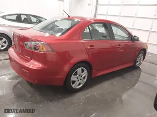2015 Mitsubishi Lancer ES with VIN JA32U2FU0FU014418, listed as a IAAI auction lot 41489892 with 55,599 mi miles. Bid and sale history available at carsss.com. Image 4.