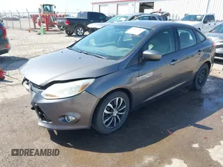2012 Ford Focus SE с VIN 1FAHP3F20CL456565, выставлен на аукционе IAAI как лот 42045389 с пробегом 164 323 миль миль и . История ставок и продаж доступна на DreamBid. Изображение 18.