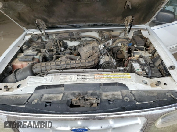 1996 Ford Explorer XL z VIN 1FMDU34X4TUB28989, wystawiony jako Copart lot #45748985 z przebiegiem 169 879 mil mil oraz Szkoda całkowita • Salvage title. Historia ofert i sprzedaży dostępna na DreamBid. Obrazek 12.
