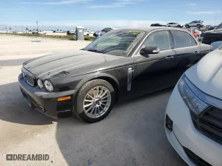 2008 Jaguar XJ with VIN SAJWA71B18SH25255, listed as a Copart auction lot 74781714 with 31,233 mi miles and Salvage Title. Bid and sale history available at carsss.com. Image 1.