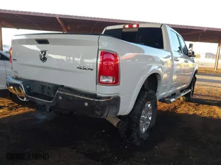 2018 Ram 2500 Laramie with VIN 3C6UR5FL0JG115269, listed as a IAAI auction lot 41310111 with 134,756 mi miles. Bid and sale history available at carsss.com. Image 4.