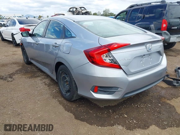 2018 Honda Civic LX with VIN 2HGFC2F50JH500559, listed as a IAAI auction lot 42040271 with 82,026 mi miles and . Bid and sale history available at DreamBid. Image 3.