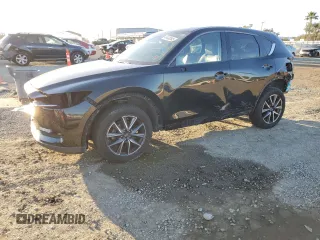 2018 Mazda CX-5 Grand Touring with VIN JM3KFBDMXJ0318474, listed as a Copart auction lot 46438545 with 58,702 mi miles and Salvage Title. Bid and sale history available at DreamBid. Image 1.
