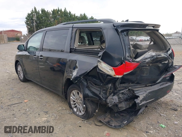 2011 Toyota Sienna XLE AAS with VIN 5TDYK3DC4BS053495, listed as a IAAI auction lot 41963995 with 215,300 mi miles and . Bid and sale history available at DreamBid. Image 3.
