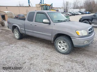 2001 Toyota Tundra Ltd with VIN 5TBBT48131S202178, listed as a IAAI auction lot 41503325 with 214,393 mi miles. Bid and sale history available at carsss.com. Image 1.