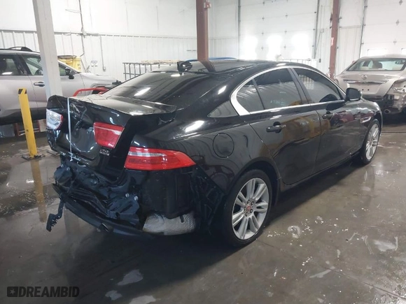 2019 Jaguar XE 25t with VIN SAJAS4FXXKCP52690, listed as a IAAI auction lot 40936551 with 79,780 mi miles. Bid and sale history available at carsss.com. Image 4.