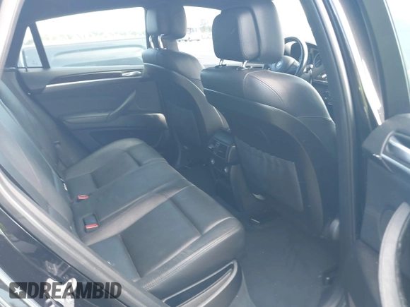 2014 BMW X6 xDrive35i with VIN 5UXFG2C5XE0C43526, listed as a IAAI auction lot 42121122 with 199,564 mi miles. Bid and sale history available at carsss.com. Image 8.