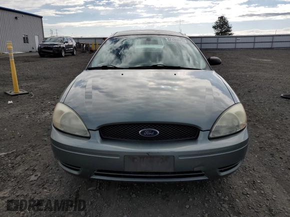 2006 Ford Taurus SE z VIN 1FAFP53U76A109890, wystawiony jako Copart lot #57135575 z przebiegiem 160 750 mil mil oraz Szkoda całkowita • Salvage title. Historia ofert i sprzedaży dostępna na DreamBid. Obrazek 5.