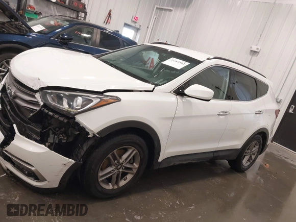 2017 Hyundai Santa Fe 2.4L z VIN 5XYZU3LBXHG444308, wystawiony jako IAAI lot #41685902 z przebiegiem 70 838 mil mil oraz . Historia ofert i sprzedaży dostępna na DreamBid. Obrazek 14.