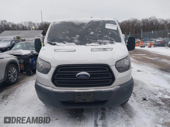 2016 Ford Transit Cargo z VIN 1FTYR2ZM7GKA78803, wystawiony jako IAAI lot #41364048 z przebiegiem 118 833 mil mil oraz . Historia ofert i sprzedaży dostępna na DreamBid. Obrazek 13.