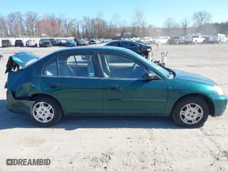 2001 Honda Civic LX with VIN 2HGES16551H567764, listed as a IAAI auction lot 41908288 with 137,740 mi miles. Bid and sale history available at carsss.com. Image 13.