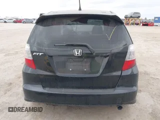 2009 Honda Fit Sport with VIN JHMGE88499S027610, listed as a IAAI auction lot 41712904 with 147,069 mi miles. Bid and sale history available at carsss.com. Image 16.