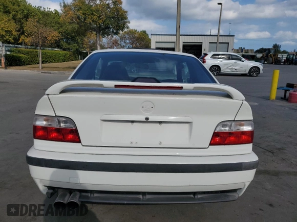 1995 BMW 3 Series M3 with VIN WBSBF9323SEH01559, listed as a Copart auction lot 48524415 with 143,316 mi miles and Salvage Title. Bid and sale history available at DreamBid. Image 6.