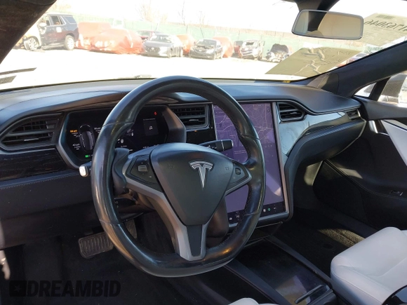 2020 Tesla Model S Long Range with VIN 5YJSA1E23LF381872, listed as a IAAI auction lot 41763046 with 96,720 mi miles and . Bid and sale history available at DreamBid. Image 23.