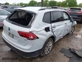 2018 Volkswagen Tiguan S with VIN 3VV1B7AX2JM120062, listed as a IAAI auction lot 41904852 with 166,909 mi miles. Bid and sale history available at carsss.com. Image 4.
