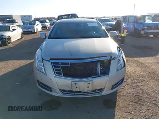 2014 Cadillac XTS with VIN 2G61L5S30E9207777, listed as a IAAI auction lot 41202654 with 112,565 mi miles. Bid and sale history available at carsss.com. Image 12.
