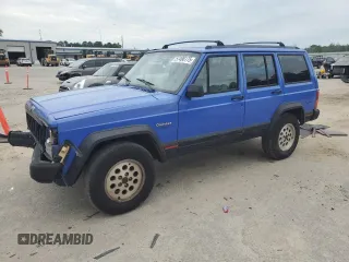 1996 Jeep Cherokee Sport with VIN 1J4FT68S8TL128381, listed as a Copart auction lot 57496175 with 221,330 mi miles and Salvage title. Bid and sale history available at DreamBid. Image 1.
