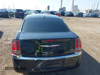 2014 Chrysler 300 C with VIN 2C3CCAKG5EH179583, listed as a IAAI auction lot 42001109 with 148,288 mi miles and . Bid and sale history available at carsss.com. Image 16.