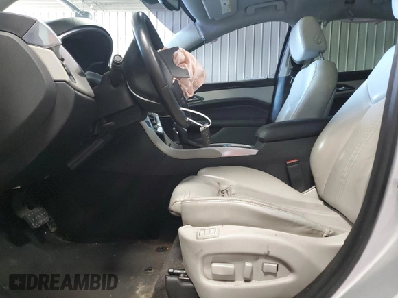 2014 Cadillac SRX Performance Collection with VIN 3GYFNFE30ES680042, listed as a Copart auction lot 56765445 with 91,174 mi miles and Non repairable. Bid and sale history available at DreamBid. Image 7.