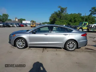 2020 Ford Fusion SE with VIN 3FA6P0LU4LR219672, listed as a IAAI auction lot 42331193 with 60,500 mi miles and . Bid and sale history available at DreamBid. Image 14.