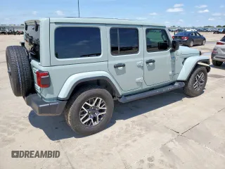 2024 Jeep Wrangler Sahara with VIN 1C4PJXEN6RW106911, listed as a Copart auction lot 58937945 with 13,948 mi miles and Salvage title. Bid and sale history available at DreamBid. Image 3.