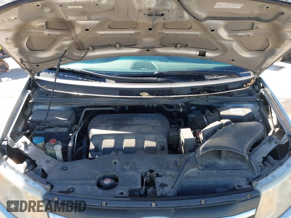 2012 Honda Odyssey EX with VIN 5FNRL5H48CB131881, listed as a IAAI auction lot 41822159 with 354,718 mi miles and . Bid and sale history available at DreamBid. Image 10.