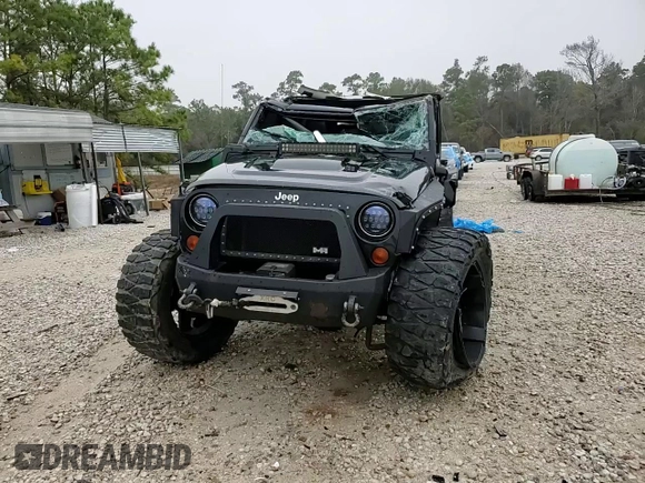 2012 Jeep Wrangler Unlimited Rubicon with VIN 1C4HJWFG7CL205244, listed as a Copart auction lot 86651914 with Not provided miles and Salvage title. Bid and sale history available at DreamBid. Image 15.
