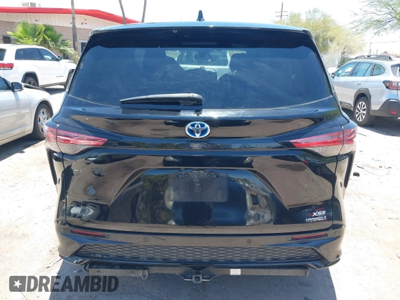 2021 Toyota Sienna XSE with VIN 5TDXRKEC6MS021909, listed as a IAAI auction lot 42432609 with 57,295 mi miles and . Bid and sale history available at DreamBid. Image 16.
