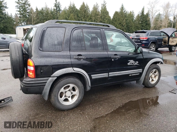 2003 Chevrolet Tracker ZR2 z VIN 2CNBJ734736946410, wystawiony jako Copart lot #82210474 z przebiegiem 61 414 mil mil oraz Szkoda całkowita • Salvage title. Historia ofert i sprzedaży dostępna na DreamBid. Obrazek 3.