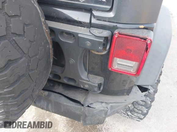 2017 Jeep Wrangler Unlimited Sport with VIN 1C4BJWDG1HL733474, listed as a IAAI auction lot 41395245 with 275,871 mi miles. Bid and sale history available at carsss.com. Image 12.