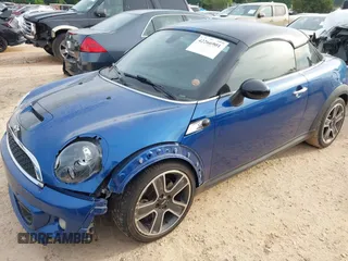 2014 MINI Coupe S z VIN WMWSX3C53ET772993, wystawiony jako IAAI lot #42266901 z przebiegiem 139 678 mil mil oraz . Historia ofert i sprzedaży dostępna na DreamBid. Obrazek 2.