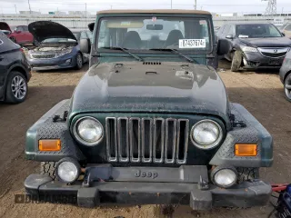2000 Jeep Wrangler Sahara with VIN 1J4FA59S6YP739265, listed as a Copart auction lot 87437674 with 208,638 mi miles and Clean title. Bid and sale history available at DreamBid. Image 5.