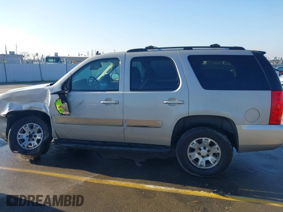 2007 GMC Yukon SLT with VIN 1GKFC13077J253697, listed as a IAAI auction lot 41277881 with 246,059 mi miles. Bid and sale history available at carsss.com. Image 14.