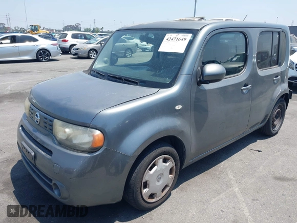 2011 Nissan Cube S z VIN JN8AZ2KR0BT213764, wystawiony jako IAAI lot #42471649 z przebiegiem 180 669 mil mil oraz . Historia ofert i sprzedaży dostępna na DreamBid. Obrazek 2.