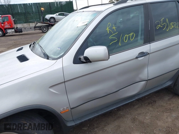 2001 BMW X5 3.0i with VIN WBAFA53571LM67411, listed as a IAAI auction lot 41727600 with 999,999 mi miles. Bid and sale history available at carsss.com. Image 6.