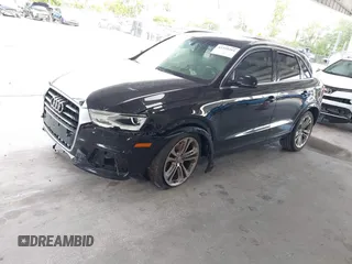 2017 Audi Q3 Premium Plus with VIN WA1HCCFS1HR013054, listed as a IAAI auction lot 42359261 with 148,435 mi miles and . Bid and sale history available at DreamBid. Image 2.