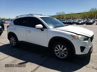 2014 Mazda CX-5 Touring z VIN JM3KE4CYXE0393443, wystawiony jako Copart lot #54738705 z przebiegiem 68 220 mil mil oraz Szkody całkowita. Historia ofert i sprzedaży dostępna na DreamBid. Obrazek 14.