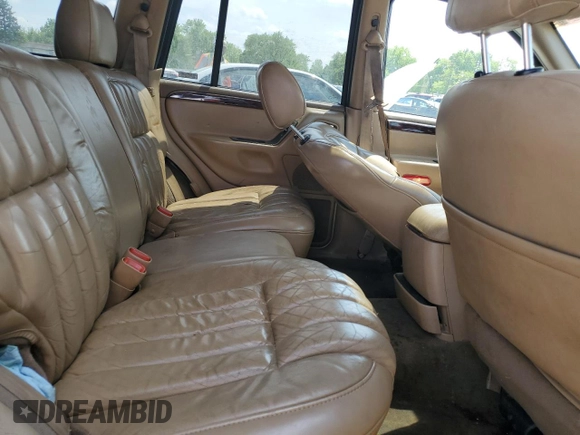 2000 Jeep Grand Cherokee Limited z VIN 1J4GW58N0YC272532, wystawiony jako Copart lot #57524225 z przebiegiem 238 921 mil mil oraz Szkoda całkowita • Salvage title. Historia ofert i sprzedaży dostępna na DreamBid. Obrazek 11.